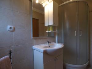 Kúpeľňa v ubytovaní Apartments Biserka + 37 fotografií