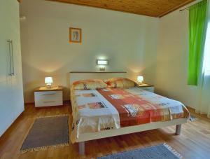 Posteľ alebo postele v izbe v ubytovaní Apartments Biserka