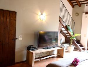 A television and/or entertainment centre at Maison Silvia