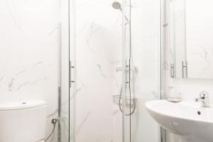 Kúpeľňa v ubytovaní Apartamento con solera en el corazón de Triana + 9 fotografií