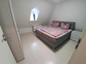 Postel nebo postele na pokoji v ubytování Ferienwohnung „Forsthaus Bigge“
