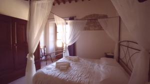 Ein Bett oder Betten in einem Zimmer der Unterkunft Villa Le Bolli