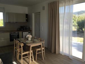 A kitchen or kitchenette at Oikia Ampavris