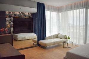 Postel nebo postele na pokoji v ubytování Flamingo Hotel