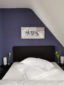 Ein Bett oder Betten in einem Zimmer der Unterkunft Hotel Zur Linde