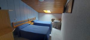 Posteľ alebo postele v izbe v ubytovaní Hostal del campo