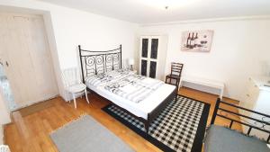 Posteľ alebo postele v izbe v ubytovaní Kilátás a tóra Apartman