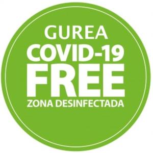 a green sign with the words guera council free at Casual Gurea in Bilbao