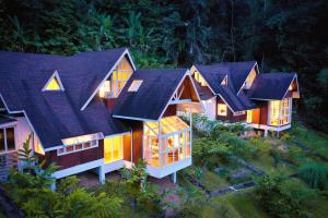 an aerial view of a house with lights on at Sutera Sanctuary Lodges At Poring Hot Springs in Ranau