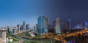 a view of a city skyline at night at Shangri-La Chengdu in Chengdu