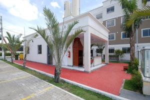 Imagem da galeria de Apt completo-Ar-TV-Portaria 24h-Piscina-Praia em Campos dos Goytacazes mais 16 fotografias