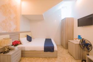 TV a/nebo společenská místnost v ubytování Khanh Uyen 1 Hotel