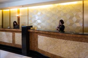 Nhân viên tại Hotel Miramar Singapore