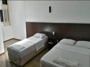 Cama o camas de una habitación en OYO Hotel Ana Cassia