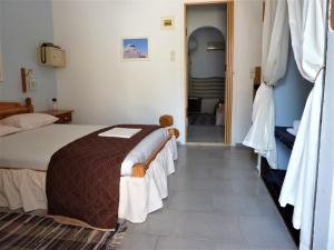 Tempat tidur dalam kamar di Chios Panorama