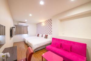 Katil atau katil-katil dalam bilik di Luodong Nightmarket Homestay