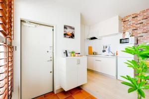Cucina o angolo cottura di サンライズハワイ