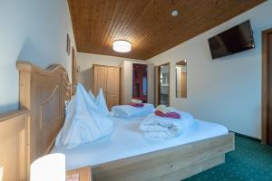 Letto o letti in una camera di Hotel Beim Winkler