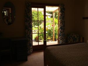 Katil atau katil-katil dalam bilik di The Innlet, Country Apartments and Cottages