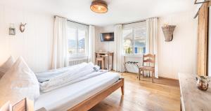 Postel nebo postele na pokoji v ubytování Hotel Kaiserstuhl