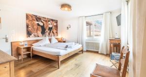Tempat tidur dalam kamar di Hotel Kaiserstuhl