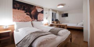 Postel nebo postele na pokoji v ubytování Hotel Kaiserstuhl