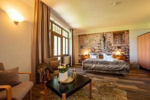Postel nebo postele na pokoji v ubytování Hotel Villa Halliger