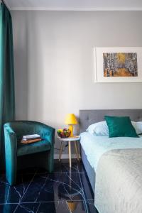 Posteľ alebo postele v izbe v ubytovaní Stylish studio in the heart of the city.