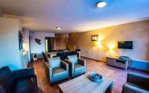 Μια τηλεόραση ή/και κέντρο ψυχαγωγίας στο Parc Madeleine - APARTMENTS