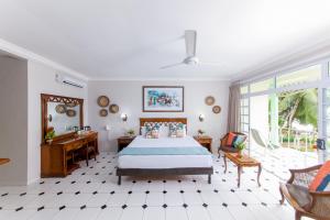 Katil atau katil-katil dalam bilik di Palm Beach Hotel