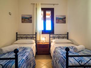 Ένα ή περισσότερα κρεβάτια σε δωμάτιο στο Case Peschiera 11 - Klodge