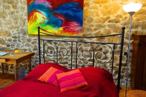 Ein Bett oder Betten in einem Zimmer der Unterkunft Gîte Valousset pour 2-4 personnes dans les montagnes de l'Ardèche