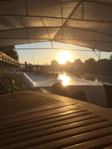 a view of the sunset from a skateboard ramp at Chambres d'hôtes sur la Meuse à bord de la Péniche Formigny in Namur