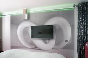 Sjónvarps- og/eða afþreyingartæki á Boutique-Hotel UPGRADE
