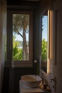 Ванная комната в Isola Polvese Resort