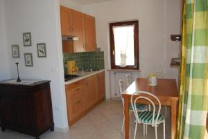Kuchyň nebo kuchyňský kout v ubytování Casa Colombo - Theater Home