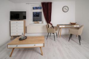 Sjónvarps- og/eða afþreyingartæki á Boutique-Hotel UPGRADE