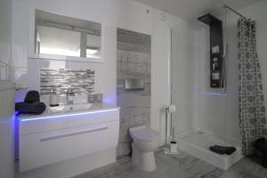 Baðherbergi á Boutique-Hotel UPGRADE