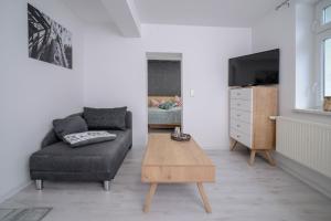 Sjónvarps- og/eða afþreyingartæki á Boutique-Hotel UPGRADE