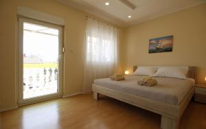 Cama o camas de una habitación en Apartments Klaric
