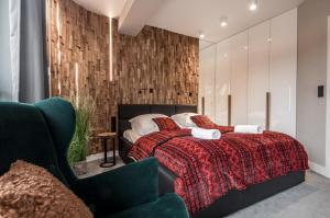 Łóżko lub łóżka w pokoju w obiekcie Apartamenty Comfort & Spa Stara Polana VIPAPARTAMENTY