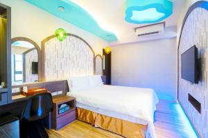 Voodi või voodid majutusasutuse 愛丁堡集團市區精品及國王雙館民宿Edinburgh Boutique Hotel toas