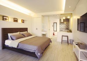 Postel nebo postele na pokoji v ubytování Comma&Spa Resort + 31 fotografií