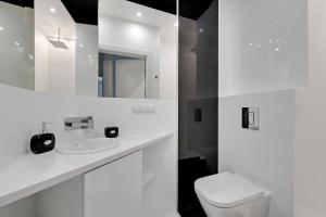 Kúpeľňa v ubytovaní Apartament AGA Motława Starówka + 18 fotografií