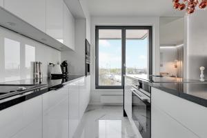 Kuchyňa alebo kuchynka v ubytovaní Apartament AGA Motława Starówka