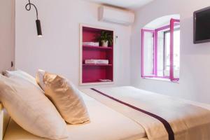 Posteľ alebo postele v izbe v ubytovaní Boutique old town house Karkovich