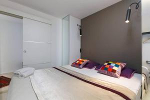 Posteľ alebo postele v izbe v ubytovaní Boutique old town house Karkovich