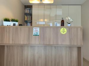 Certyfikat, podpis lub inny dokument wystawiony w obiekcie Marina Jastarnia Apartamenty w budynku z Basenem