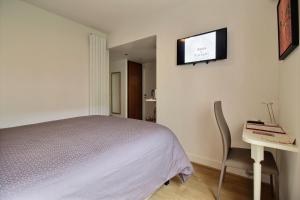 TV a/nebo společenská místnost v ubytování Assia & Nathalie - Luxury B&B MARAIS