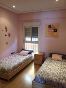 A bed or beds in a room at apartamento fuengirola Oasis Beach